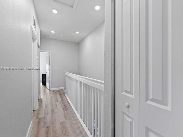 18058 SW 147th Ct, Miami, FL 33187 - hallway featuring light wood-style flooring and recessed lighting