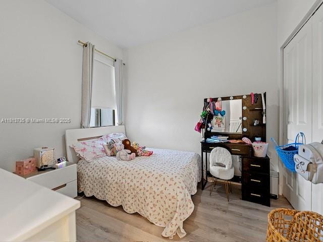 18058 SW 147th Ct, Miami, FL 33187 - bedroom with light wood-type flooring and a closet