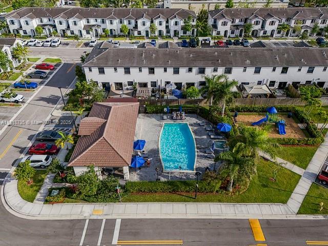 18058 SW 147th Ct, Miami, FL 33187 - aerial perspective of suburban area with a pool