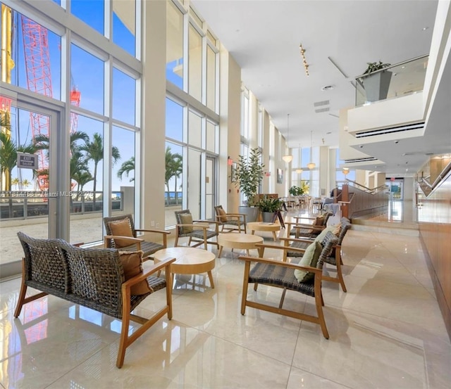 18683 Collins Ave Unit 2510, Sunny Isles Beach, FL 33160 - community lobby with a towering ceiling and expansive windows