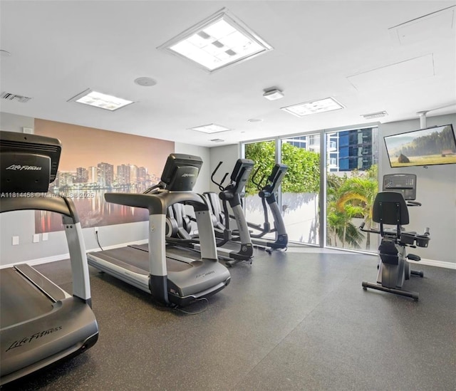 18683 Collins Ave Unit 2510, Sunny Isles Beach, FL 33160 - exercise room with a wall of windows and attic access