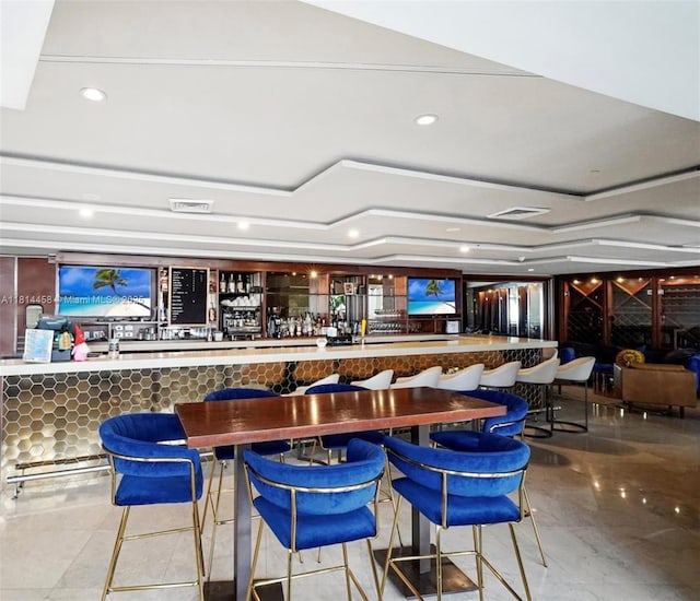 18683 Collins Ave Unit 2510, Sunny Isles Beach, FL 33160 - bar area with a tray ceiling, tile patterned floors, and recessed lighting