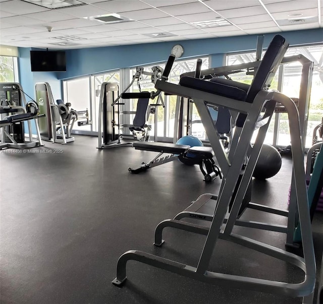 18683 Collins Ave Unit 2510, Sunny Isles Beach, FL 33160 - gym featuring a paneled ceiling
