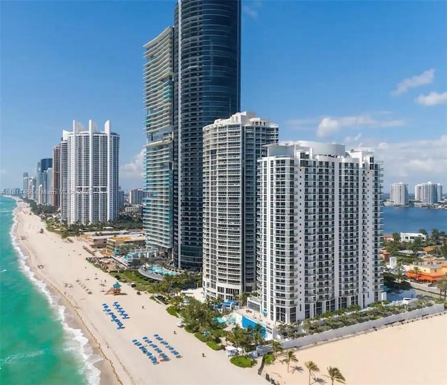 18683 Collins Ave Unit 2510, Sunny Isles Beach, FL 33160 - view of building exterior with view of water and beach and a city view