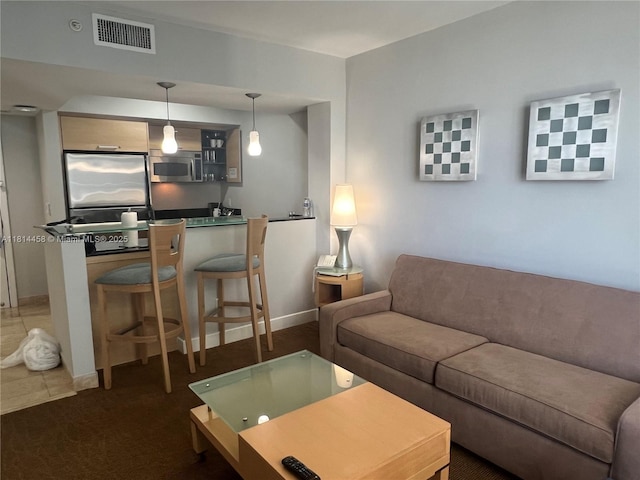 18683 Collins Ave Unit 2510, Sunny Isles Beach, FL 33160 - carpeted living area featuring baseboards