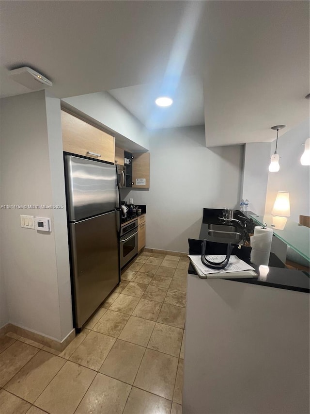 18683 Collins Ave Unit 2510, Sunny Isles Beach, FL 33160 - kitchen with appliances with stainless steel finishes and light tile patterned flooring