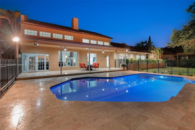 13241 SW 32nd Ct, Davie, FL 33330 - view of swimming pool with french doors and a patio