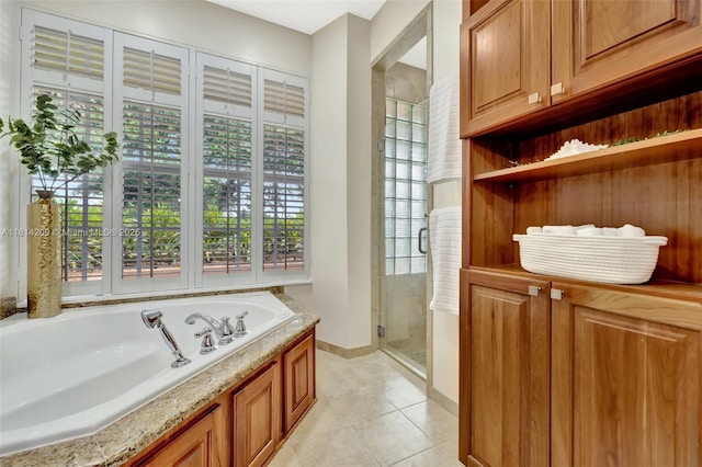 13241 SW 32nd Ct, Davie, FL 33330 - full bath with a bath, a stall shower, tile patterned flooring, and healthy amount of natural light