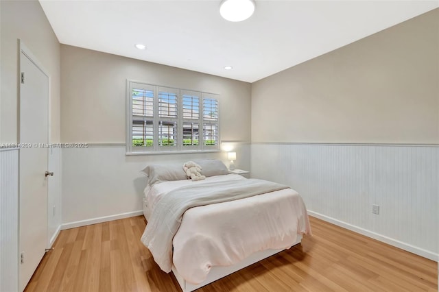 13241 SW 32nd Ct, Davie, FL 33330 - bedroom featuring a wainscoted wall and light wood-type flooring