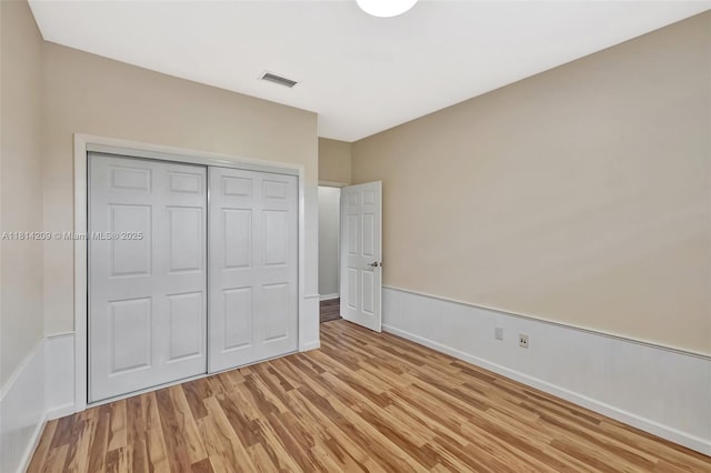 13241 SW 32nd Ct, Davie, FL 33330 - unfurnished bedroom featuring light wood finished floors and a closet
