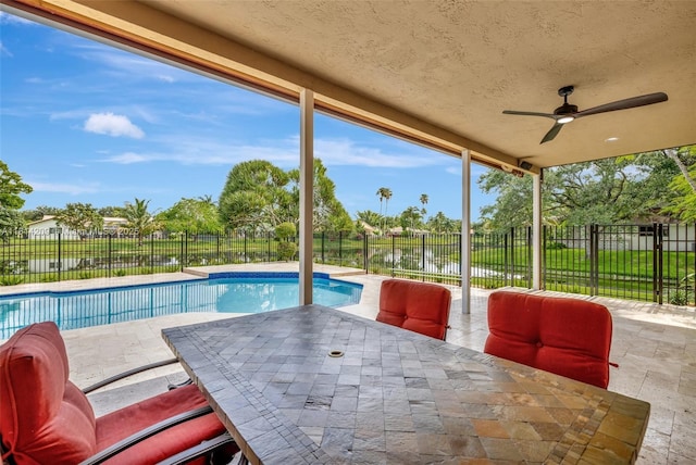 13241 SW 32nd Ct, Davie, FL 33330 - view of pool with a patio area, ceiling fan, outdoor dining space, and a fenced backyard
