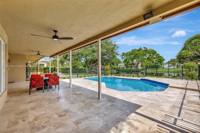 13241 SW 32nd Ct, Davie, FL 33330 - view of swimming pool with a patio area, ceiling fan, and a fenced backyard