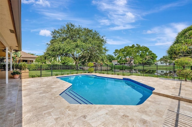13241 SW 32nd Ct, Davie, FL 33330 - view of swimming pool featuring a patio and a fenced backyard