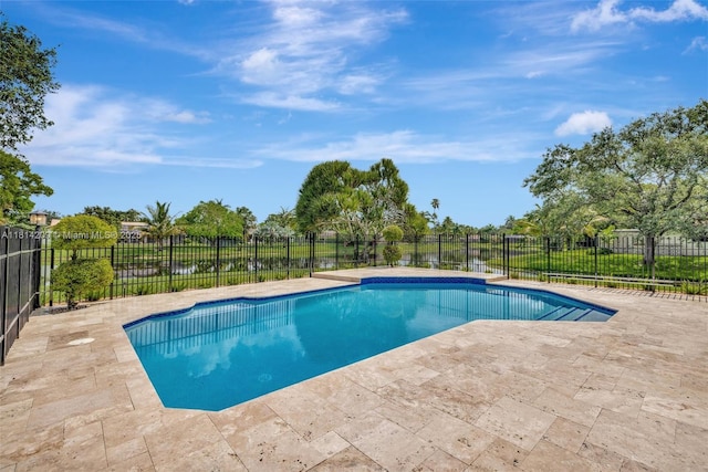 13241 SW 32nd Ct, Davie, FL 33330 - view of swimming pool with a patio