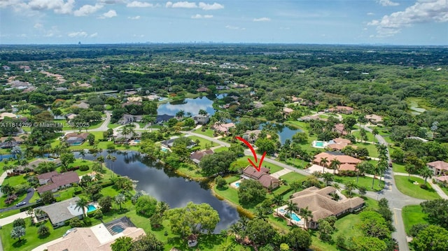 13241 SW 32nd Ct, Davie, FL 33330 - aerial view of property and surrounding area featuring a nearby body of water and nearby suburban area