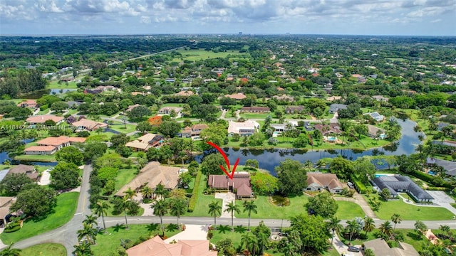 13241 SW 32nd Ct, Davie, FL 33330 - aerial perspective of suburban area with a large body of water