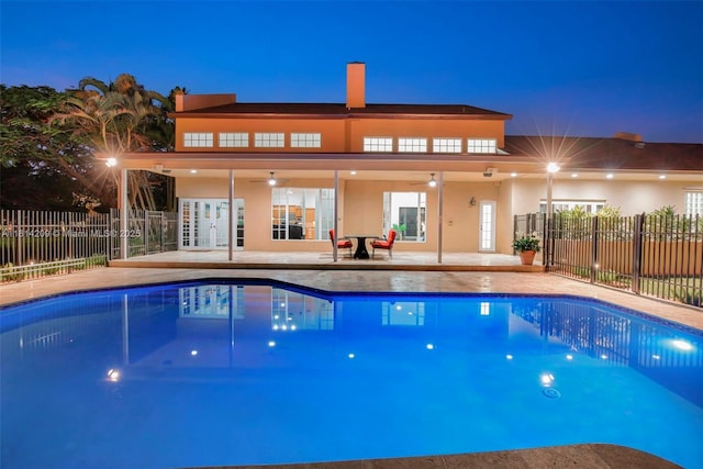 13241 SW 32nd Ct, Davie, FL 33330 - view of swimming pool featuring a patio and french doors