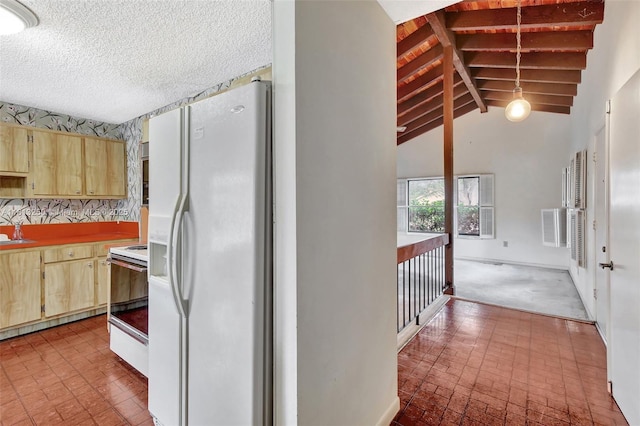 1360 NW 94th Ave, Plantation, FL 33322 - kitchen featuring white appliances, brick patterned flooring, light brown cabinetry, vaulted ceiling, and decorative light fixtures