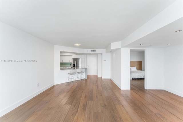 1900 Sunset Harbour Dr Unit 1814, Miami Beach, FL 33139 - unfurnished living room with light wood finished floors and recessed lighting