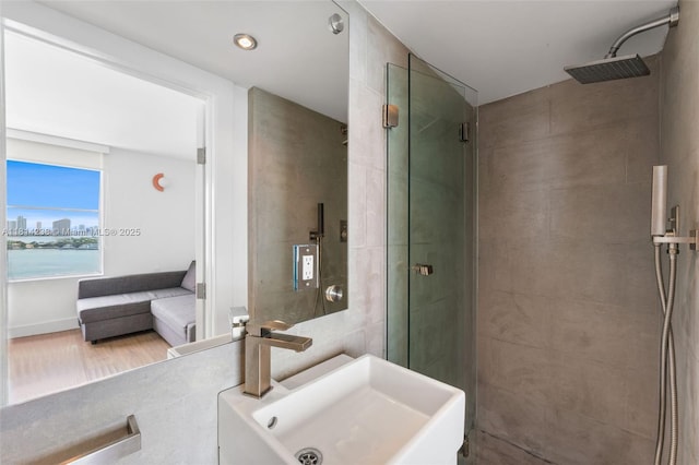1900 Sunset Harbour Dr Unit 1814, Miami Beach, FL 33139 - bathroom with tiled shower, wood finished floors, and a view of city
