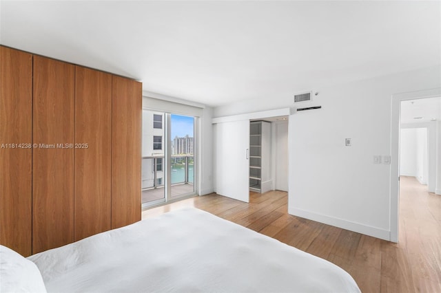 1900 Sunset Harbour Dr Unit 1814, Miami Beach, FL 33139 - unfurnished bedroom with access to outside and wood finished floors