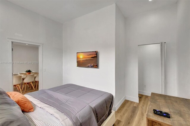 920 SW 8th Ct, Miami, FL 33130 - bedroom featuring light wood-style floors and baseboards