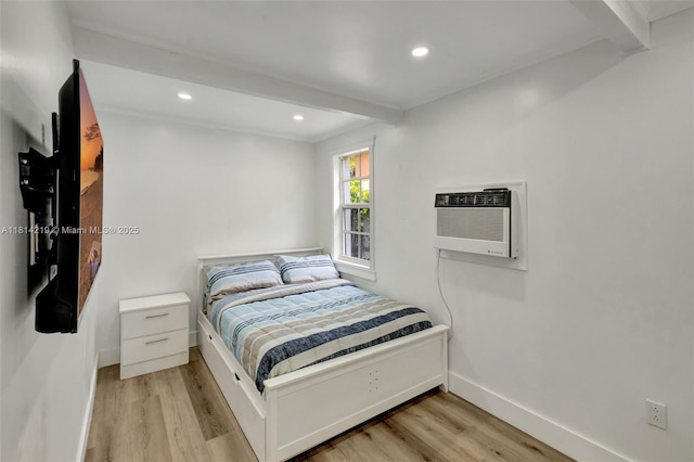 920 SW 8th Ct, Miami, FL 33130 - bedroom featuring light wood-style flooring, beamed ceiling, recessed lighting, and a wall mounted air conditioner