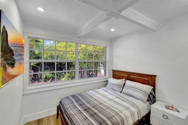 920 SW 8th Ct, Miami, FL 33130 - bedroom featuring beam ceiling, wood finished floors, multiple windows, and recessed lighting