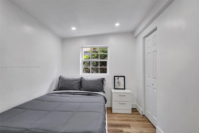 920 SW 8th Ct, Miami, FL 33130 - bedroom with light wood-style floors, recessed lighting, and a closet
