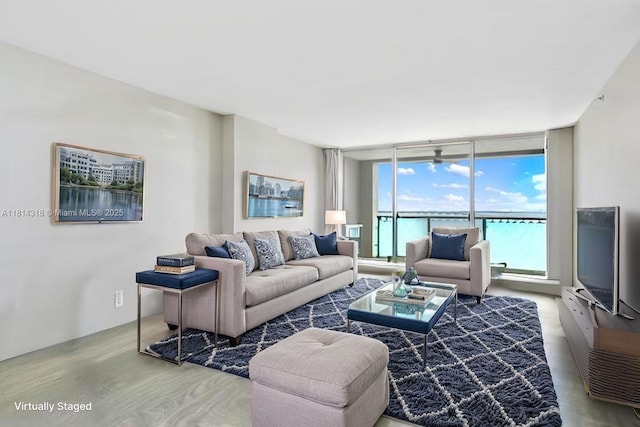1541 Brickell Ave Unit A1202, Miami, FL 33129 - living area featuring expansive windows and wood finished floors