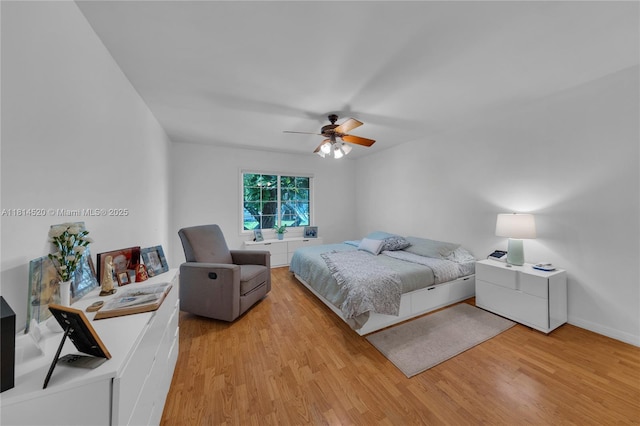 14630 SW 147th Ct, Miami, FL 33196 - bedroom with wood finished floors, a ceiling fan, and baseboards