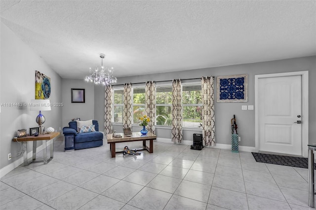15240 SW 188th St, Miami, FL 33187 - living room featuring a textured ceiling, a chandelier, and light tile patterned floors