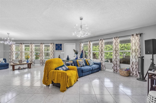 15240 SW 188th St, Miami, FL 33187 - living area with a chandelier, a textured ceiling, healthy amount of natural light, and light tile patterned floors