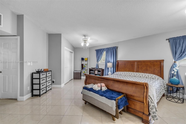 15240 SW 188th St, Miami, FL 33187 - bedroom with a textured ceiling, ceiling fan, and light tile patterned flooring