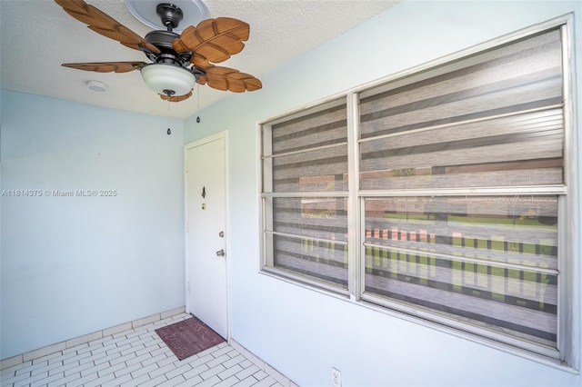 5300 Washington St Unit T227, Hollywood, FL 33021 - view of exterior entry featuring stucco siding and ceiling fan