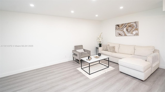 5300 Washington St Unit T227, Hollywood, FL 33021 - living area with light wood-style floors, recessed lighting, and baseboards