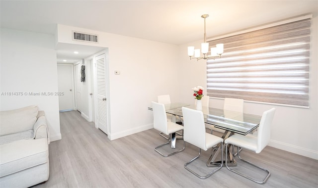 5300 Washington St Unit T227, Hollywood, FL 33021 - dining area featuring a chandelier, wood finished floors, baseboards, and recessed lighting
