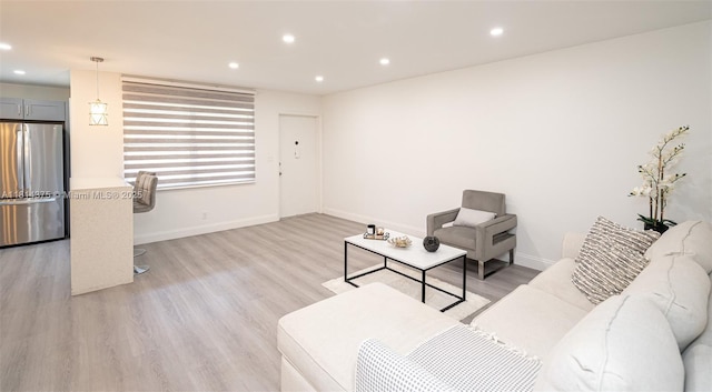 5300 Washington St Unit T227, Hollywood, FL 33021 - living room with recessed lighting, light wood-style flooring, and baseboards