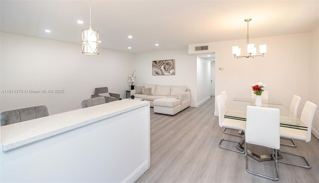 5300 Washington St Unit T227, Hollywood, FL 33021 - dining room with light wood-style floors, a chandelier, recessed lighting, and baseboards
