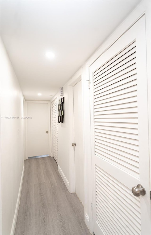 5300 Washington St Unit T227, Hollywood, FL 33021 - corridor with light wood-style flooring and baseboards