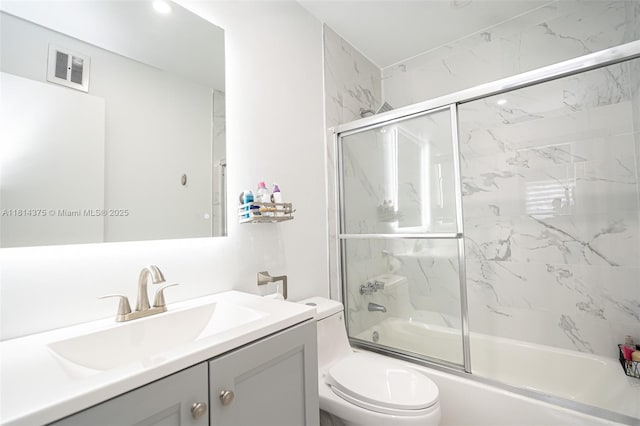 5300 Washington St Unit T227, Hollywood, FL 33021 - full bathroom featuring toilet, vanity, and bath / shower combo with glass door