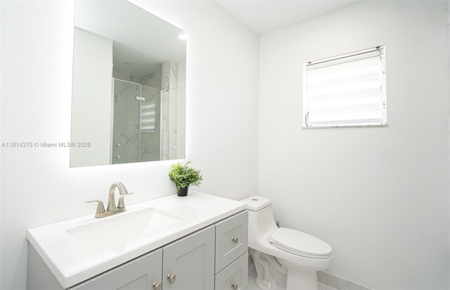 5300 Washington St Unit T227, Hollywood, FL 33021 - bathroom with vanity, a marble finish shower, and toilet