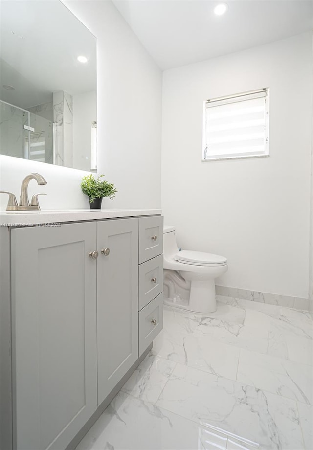 5300 Washington St Unit T227, Hollywood, FL 33021 - bathroom featuring toilet, marble look tile flooring, vanity, recessed lighting, and a marble finish shower