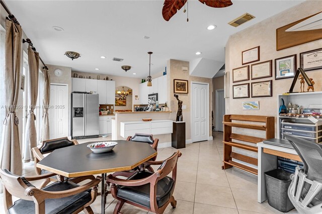 8753 SW 3rd Ln, Miami, FL 33174 - dining area featuring light tile patterned floors, recessed lighting, ceiling fan, and a chandelier