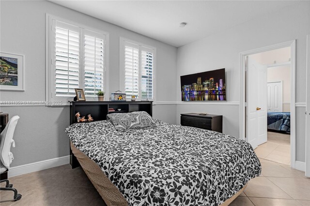 8753 SW 3rd Ln, Miami, FL 33174 - tiled bedroom with baseboards