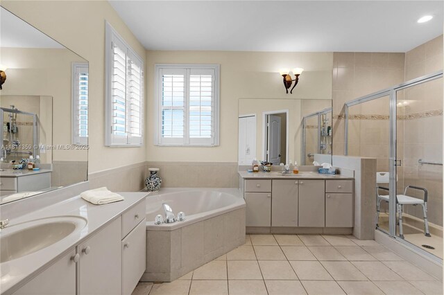8753 SW 3rd Ln, Miami, FL 33174 - full bathroom featuring a stall shower, two vanities, a garden tub, and tile patterned floors