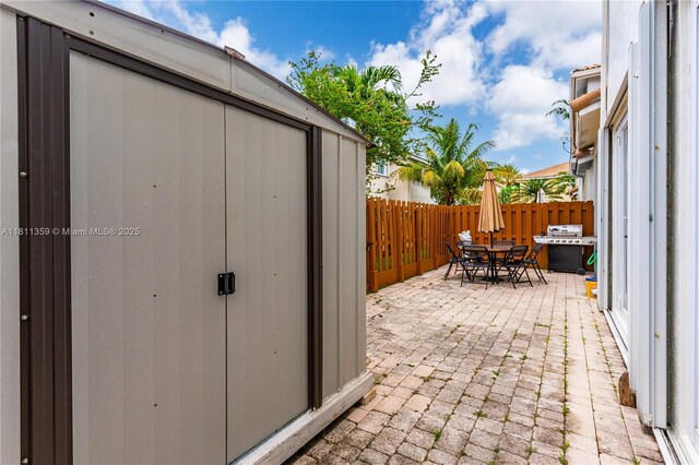 8753 SW 3rd Ln, Miami, FL 33174 - fenced backyard with outdoor dining space, a patio, and area for grilling