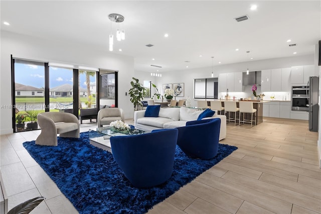 4381 SW 178th Ave, Miramar, FL 33029 - living area featuring light wood-type flooring