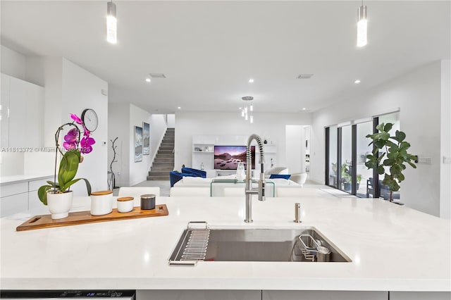 4381 SW 178th Ave, Miramar, FL 33029 - kitchen featuring open floor plan, a sink, light countertops, recessed lighting, and a kitchen island with sink