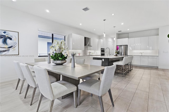 4381 SW 178th Ave, Miramar, FL 33029 - dining room with recessed lighting, baseboards, and light wood finished floors